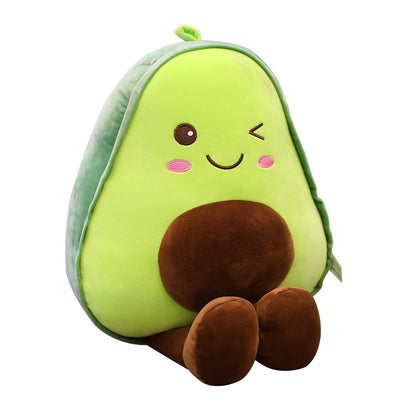 A smiling avocado plush pillow on a white background